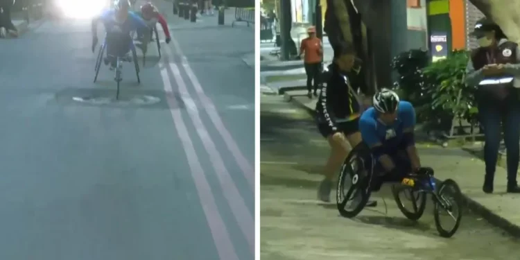 Competidor en arnés de ruedas sufre aparatoso accidente por culpa de una coladera y abandona Maratón