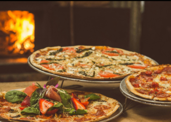 Cine Colombia y Cinepolitana celebran el ‘Día universal de la Pizza’ con comida gratis y descuentos